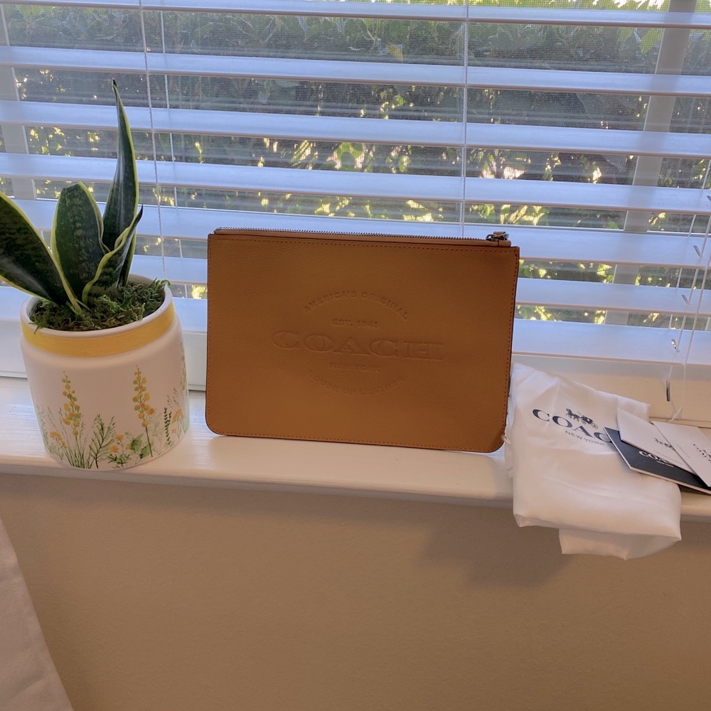 SOLD! New COACH wristlet